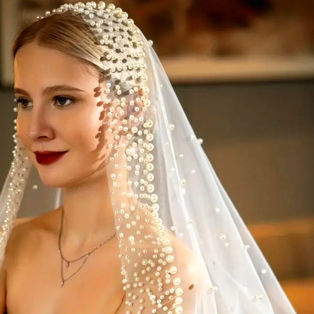 Creamy white cathedral veil with beautiful beading